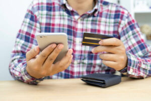 How are NFC business cards different from traditional smart cards?